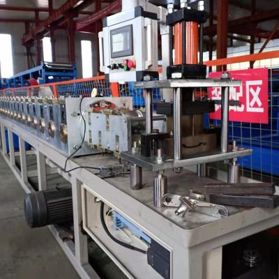 Chine Petit pain en acier de cadre de porte en métal du volet 1.5mm de rouleau de bande formant la machine à vendre