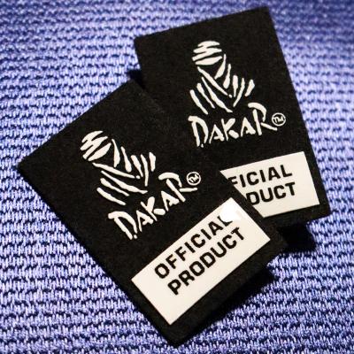 China Custom Label Glossy Silicone Label Warmtetransfer Label Rubber Logo voor kledingstukken Te koop