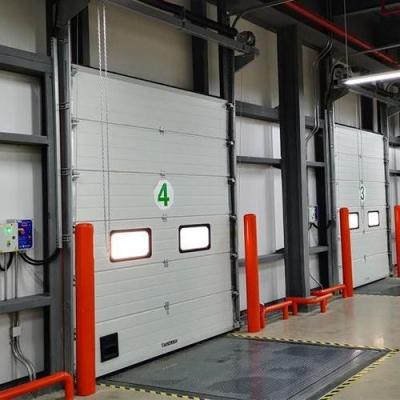 China Automatic Vertical Lifting Industrial Sectional Doors Polyurethane Foam Insulation for sale