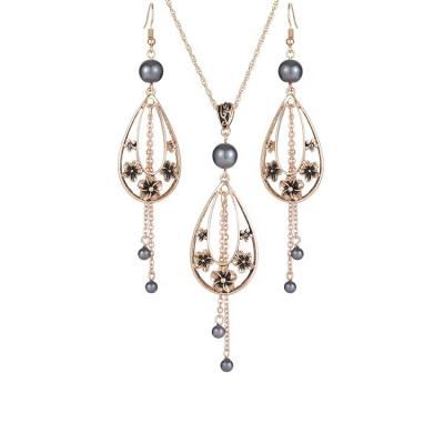 China Hard Drop 2021 Shape Zinc Alloy Hard Women Earrings Wedding Jewelry Sets Hawaii Earring Necklace for sale