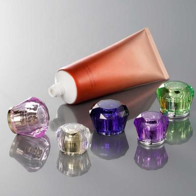 China Skincare cosmetic packaging manufacturer,acrylic screw cap for cosmetic tube,acrylic screw diamond cap for sale