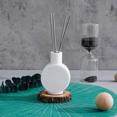 China Wholesale Modern Custom Essential Oil Aromatherapy Glass Bottle Home Decoration 100ml White Empty Tubular Diffuser Glass Bottle for sale