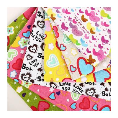 China Blackout Canvas Fabric For Bag Making Thickened Plain Polyester Cotton Printed Love Cartoon Tablecloth Sofa Picnic Fabric Wholesale for sale