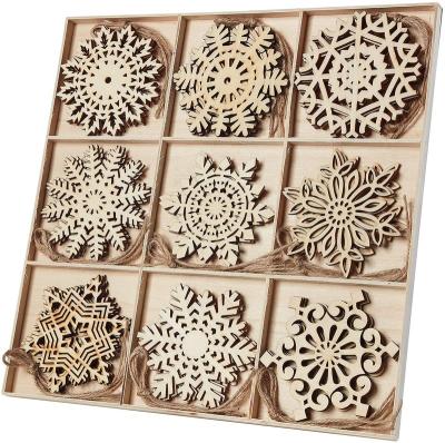 China Europe Wooden Snowflake Hollowed Out Snowflakes Embellishments Christmas Tree Hanging Ornaments for sale