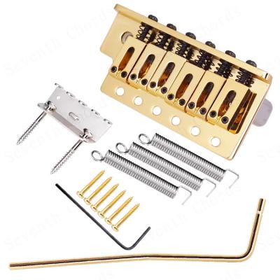 China GUITAR gold color Guitar tremolo bridge with modern saddle for St viberato bridge for sale
