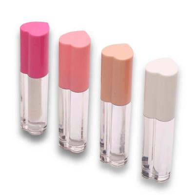 中国 4ml Cosmetic Packaging Container Heart Shape Clear Gloss Tubes With Wand Empty Plastic Bottle 販売のため