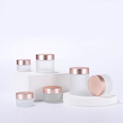 中国 15g 30g 50g Cosmetic Packaging Container Empty Frosted Glass Face Cream Jars Rose Gold Lid 販売のため