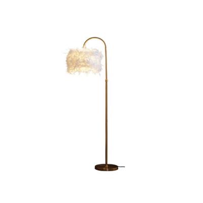China Modern Creative Brilliant Feather Floor Lamp Modern Simple Fashion Living Room Bedroom Bedside Vertical Desk Lamp for sale