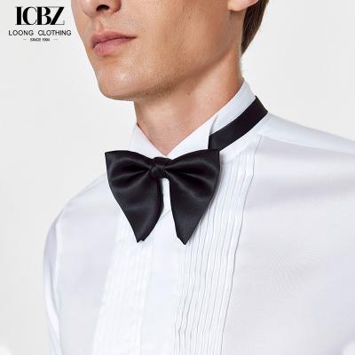 China Camiseta sin hierro para hombres de estilo comercial tipo de cierre de pecho único con tela de velour en venta