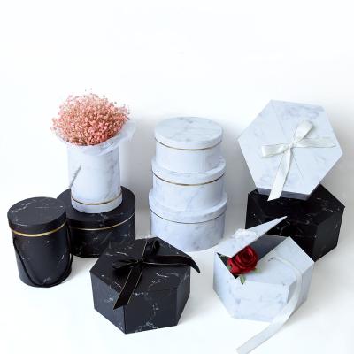 中国 紙紙 オーダーメイド 丸丸の大理石印刷 ローゴ付きの花箱 販売のため