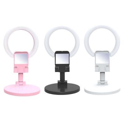 China Mini Phone A7 Folding Bracket Fill Desk Light Two-in-One Dual-Use Portable And Versatile Beauty Table Lamp Ring Light for sale