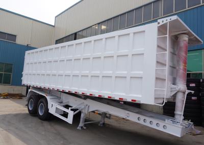 Cina TITAN VEHICLE 2 axle 30 cbm steel semi end dump trailers for bad road work in vendita