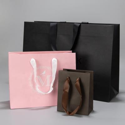 China Recycled Luxury Paper Logo Shopping Jewelery Gift Custom Materials Shoe Clothes Paper Packaging Tote Bag With Ribbon Handle for sale