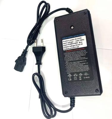 China Potente y conveniente cargador de batería de adaptador 25.2V 2A para baterías de litio de potencia C en venta
