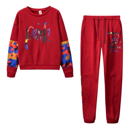 China 2022 autumn and winter ladies QUICK DRY fashion printed women's two-piece set polyester sportswear wholesale for sale