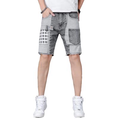 China Customized Slim Shorts Mens Breathable Stretch Slim Fit Summer Stitching 5 Point Jeans for sale