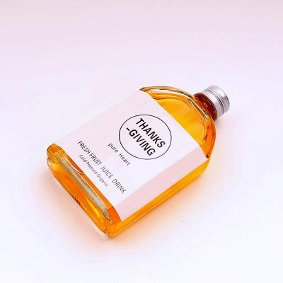China Liquid Packing Bottle Tea Beverage Wine Bottle Thickened Glass Bottle for sale