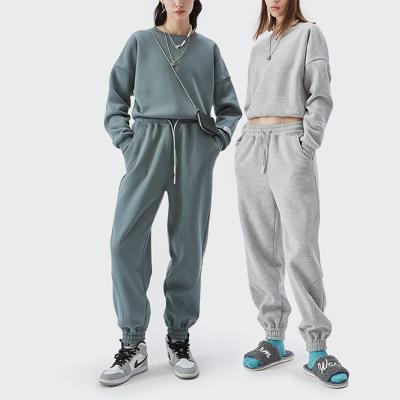 China Anti-wrinkle trend solid color fleece sweat suits pure cotton loose women pullovers suit casual breathable women's empty jogging suit for sale
