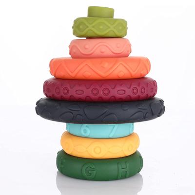 China Silicone 9pcs Eco-friendly Material Stacking and Interlocking Circle Toy Soft Baby Building Blocks Ring Stacker Teether for sale