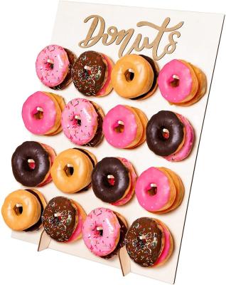 China Viable Wholesale 2022 Wooden Donuts Wall Display Stand For Wedding Party Decoration Donuts Holders for sale