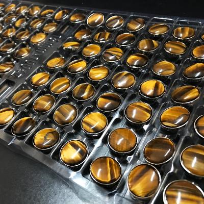China Clothing stone accessories, natural yellow tiger eye stone buttons for sale