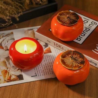China Luxury Creative Ceramic Essential Oil Burner Aromatherapy Canister Tea Persimmon Tea Light CandleJar Candle Holder for sale