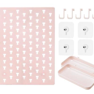 China Minimalist Minimalist Non-listing No Punch Hole Panel Living Room Kitchen Bathroom Wall Hooks Storage Rack for sale