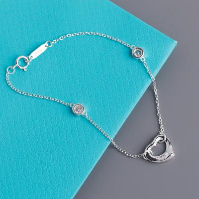 China Fashionable 925 Mengmingna Bracelets Hollow Heart Shaped Silver 17cm Frame Setting CZ Stone Women Bracelet for sale
