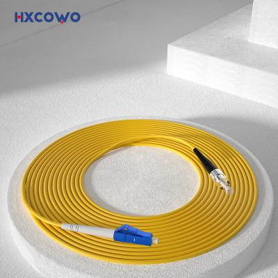 China HXCOWO SM SX G657A2 LC/UPC-FC 2 3mm LSZH Armored Fiber Optic Cable for Wired LAN Network Wavelength 850nm/1310nm/1550nm for sale