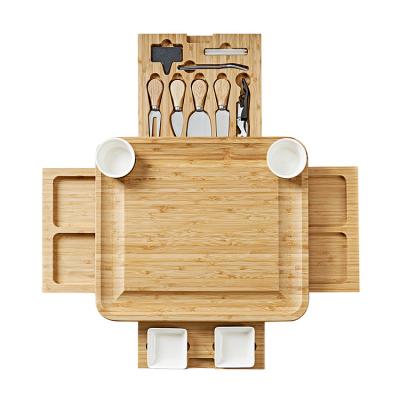 China Sustainable Natural Wooden Charcuterie Board Kits Unique Bamboo Charcuterie Cheese Board Tray With Knife Set for sale