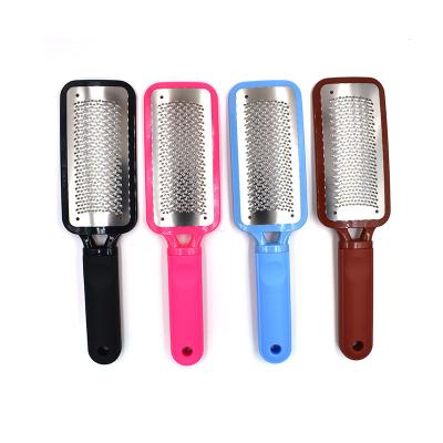 China Feet Pedicure Rasp Remover with Plastic Handle and Stainless Steel Foot File Heel Grater for sale