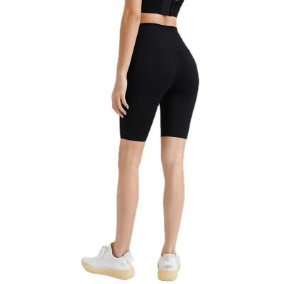 China Solid Color Breathable Hip Lifting Plus Size Womens Shorts Elastic Gaiters Shorts Sexy Girls Yoga Shorts for sale