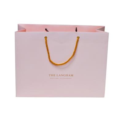 China Logo Design Luxury Paper Bag Recyclable Customized Gift Packaging Bag Shopping Paper Bag With Ribbon Handle for sale