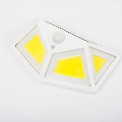China Super Bright Polycarbonate Passage Light Practical Outdoor Led Wall Light With Solar Panels 100 COB Solar Powered Rechargeable Wall Lamp for sale