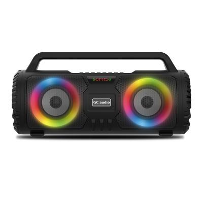 China New high quality private outdoor portable wireless BT speaker with color lights rechargeable battery changing fm radio USB TF MIC in it for sale