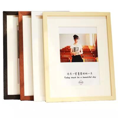China Large 11x14 16x20 20x28 24x36 A4 Photo Picture Frame Wall Black White Modern Elegant Simple Wooden Frame for sale