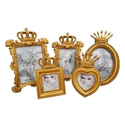China Retro 6 Inch Creative Plastic Golden Resin Picture Photo Frame Small 7 Inch Wedding Picture Frame Nordic European Crown Decoration Table for sale