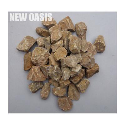 China Yellow brown Natural Decorative Unpolished Pebble Stone Gravel Paving Outdoor Ornamental Stones for Garden Plant park Railway for sale