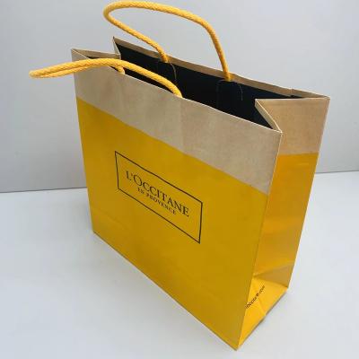 China Recyclable Wholesale Custom Logo Folded Gift Bags Colorful Paper Shopping Bags Kraft Paper Bags for sale