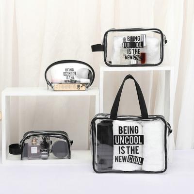 China Waterproof Shockproof Dustproof Letter Printed Clear PVC Pouch Cosmetic Bag Set Ladies Makeup Case Bag for sale
