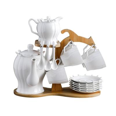 China Stocked Professional Production Home Fashion Tea Set Ceramics Sunflower Coffee Teapot Set for sale