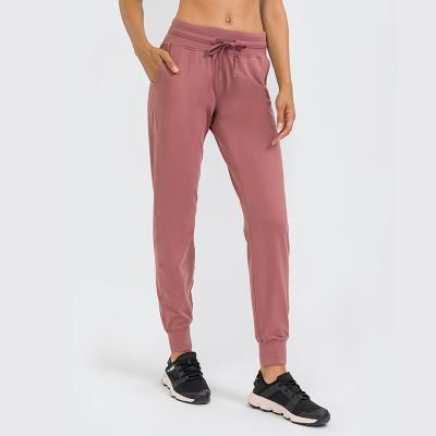 China Anti-wrinkle Wholesale Women Clothing With Pockets Joggers Leggings Gym Wear Nylon Spandex Blank Women's Jogger Pants Sweat Pants for Women for sale