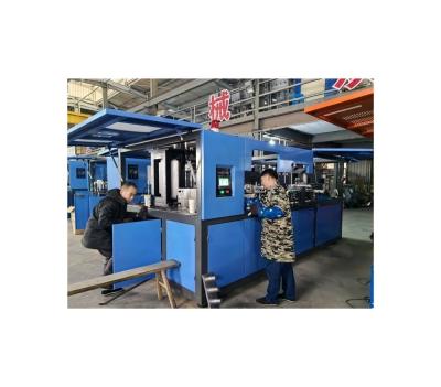 China 4 cavidades botella de hacer máquina soplar moldeado máquina de soplar dentro de 3200 * 1600 * 1920mm en venta