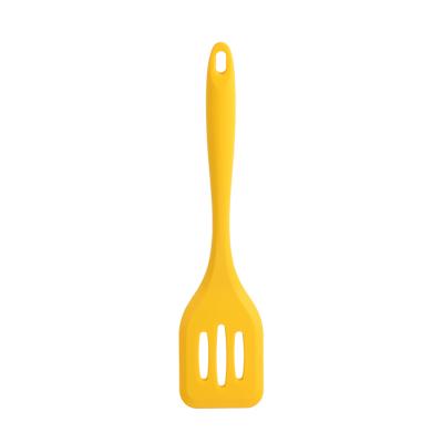 China Sustainable Food Grade Silicone Nonstick Kitchen Cooking Slotted Turner In Yellow Color for sale