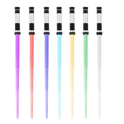 China Colorful LED Lights Up Plastic Wholesale Light Up Double Blade Laser Sword Halloween Lightsaber Colorful Light Toy for sale