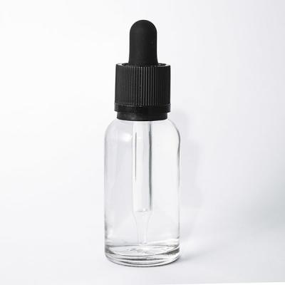 Chine Lissez les bouteilles en verre claires ouvertes de compte-gouttes d'huile essentielle avec le chapeau résistant d'enfant à vendre