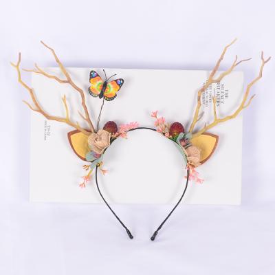 China Newest Environmental Friendly Jewelry Colored Led Flower Butterfly Headband Artificial Tree Branch Colored Lantern Christmas Elk Horn Hair Band Women for sale