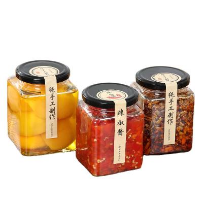 China Hot Sale 60ml 380ml 600ml Clear Square Food Glass Jar For Hot Use Chili Spice Sauce Jam Honey Candy for sale
