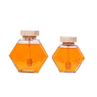 China Wholesale 220ml 380ml 250g 500g Food Natural Royal Glass Honey Jar Container Empty Hexagon Cover Bamboo Honey Jar With Plunger for sale
