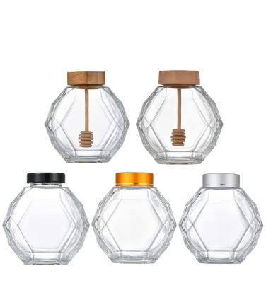 China Other New Design 100ml Hexagonal Borosilicate Glass Honey Bottle Kitchen Storage Glass Honey Jar With Bamboo Wooden Lid for sale